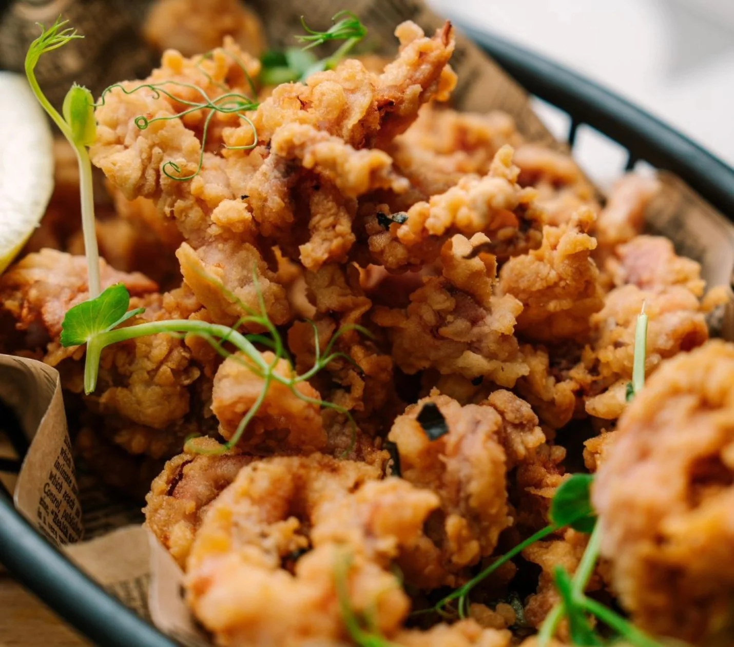 Crispy seafood served with lemon