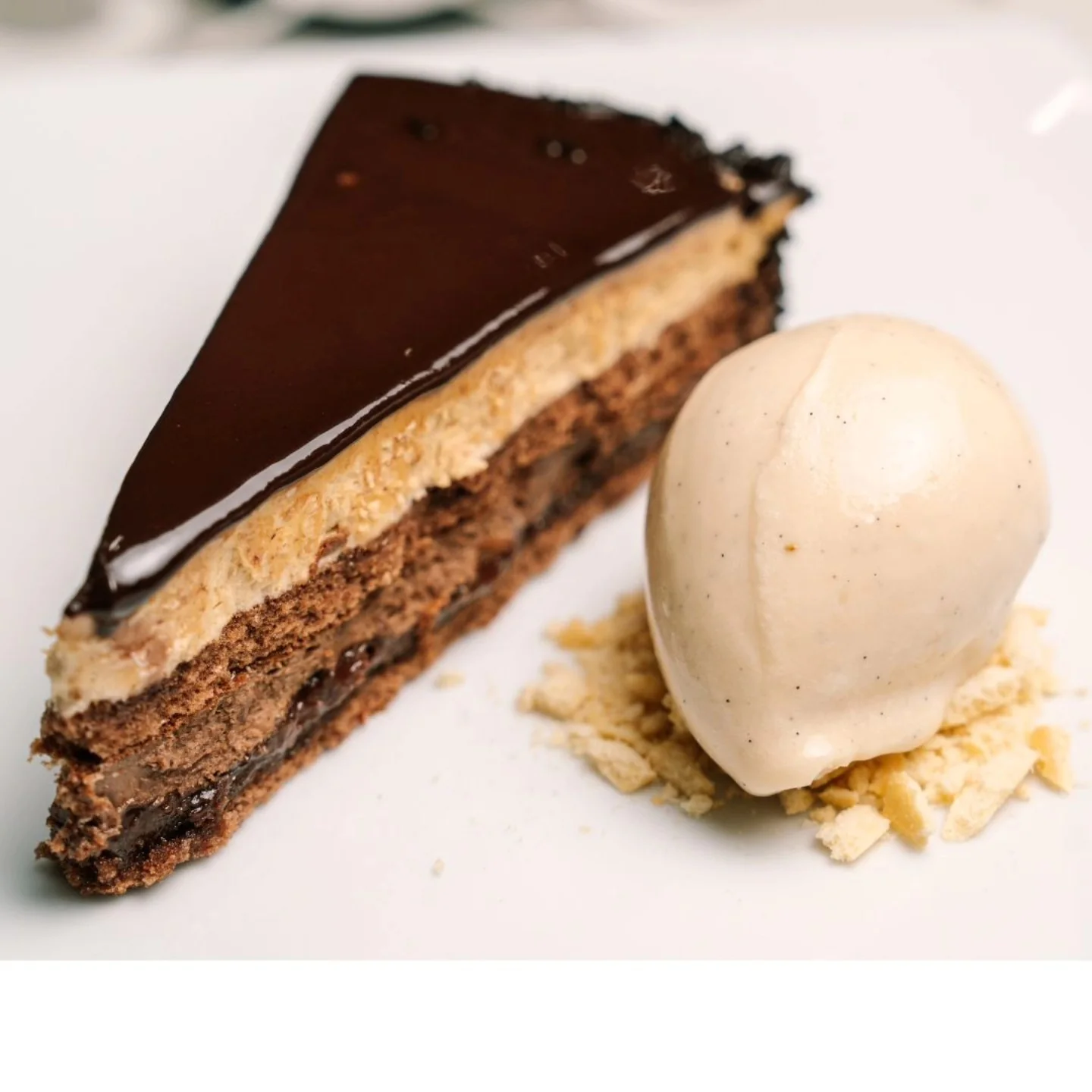 Chocolate dessert served with a scoop of ice cream