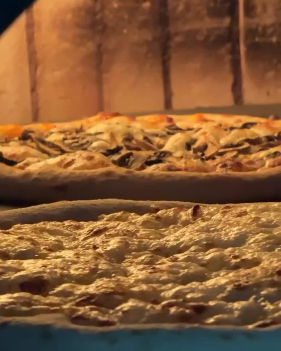 Pizza baking in the oven