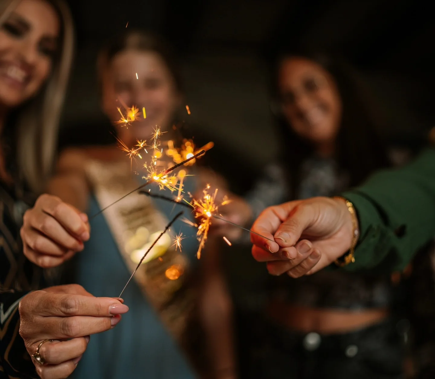 Guests celebrating together with sparklers